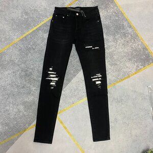 Amiri Ripped Black Jeans